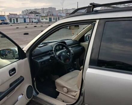 Серый Ниссан ИксТрейл, объемом двигателя 2.2 л и пробегом 256 тыс. км за 8000 $, фото 2 на Automoto.ua