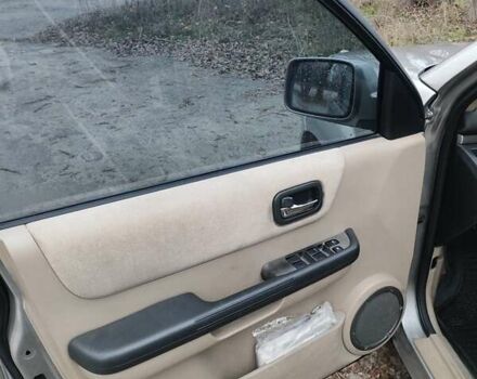 Сірий Ніссан ІксТрейл, об'ємом двигуна 2 л та пробігом 200 тис. км за 5900 $, фото 10 на Automoto.ua