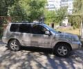 Серый Ниссан ИксТрейл, объемом двигателя 2.2 л и пробегом 281 тыс. км за 6000 $, фото 1 на Automoto.ua