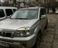 Серый Ниссан ИксТрейл, объемом двигателя 2.2 л и пробегом 308 тыс. км за 1500 $, фото 1 на Automoto.ua
