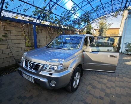 Серый Ниссан ИксТрейл, объемом двигателя 2 л и пробегом 320 тыс. км за 5500 $, фото 1 на Automoto.ua