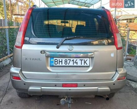 Сірий Ніссан ІксТрейл, об'ємом двигуна 2 л та пробігом 253 тис. км за 5500 $, фото 1 на Automoto.ua