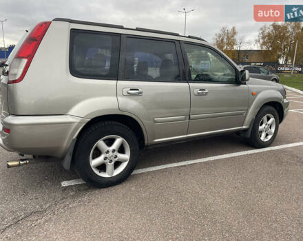 Серый Ниссан ИксТрейл, объемом двигателя 2 л и пробегом 336 тыс. км за 5750 $, фото 5 на Automoto.ua