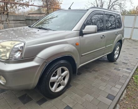 Серый Ниссан ИксТрейл, объемом двигателя 2.5 л и пробегом 286 тыс. км за 5800 $, фото 2 на Automoto.ua