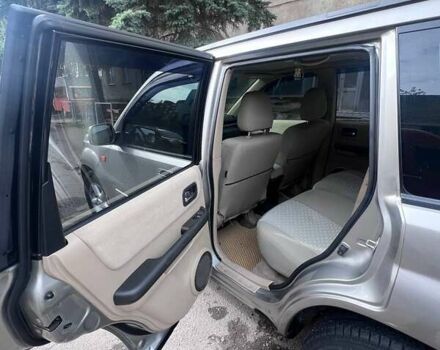 Серый Ниссан ИксТрейл, объемом двигателя 2 л и пробегом 262 тыс. км за 7079 $, фото 16 на Automoto.ua