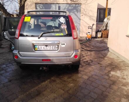 Серый Ниссан ИксТрейл, объемом двигателя 2.5 л и пробегом 239 тыс. км за 5800 $, фото 1 на Automoto.ua