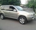 Серый Ниссан ИксТрейл, объемом двигателя 2 л и пробегом 330 тыс. км за 5759 $, фото 1 на Automoto.ua