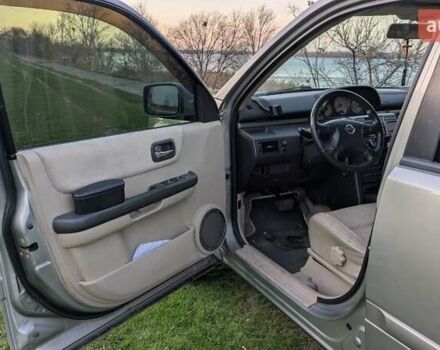 Серый Ниссан ИксТрейл, объемом двигателя 2.5 л и пробегом 193 тыс. км за 6500 $, фото 6 на Automoto.ua