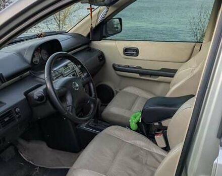 Серый Ниссан ИксТрейл, объемом двигателя 2.5 л и пробегом 193 тыс. км за 6500 $, фото 7 на Automoto.ua