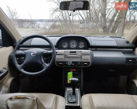 Сірий Ніссан ІксТрейл, об'ємом двигуна 2 л та пробігом 200 тис. км за 5900 $, фото 14 на Automoto.ua