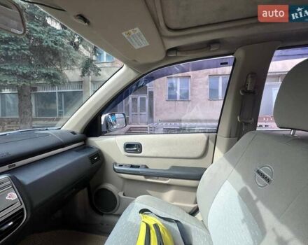 Серый Ниссан ИксТрейл, объемом двигателя 2 л и пробегом 262 тыс. км за 7079 $, фото 26 на Automoto.ua