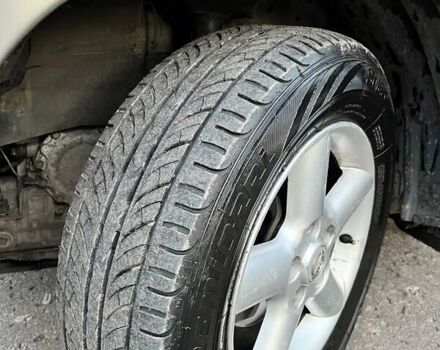 Сірий Ніссан ІксТрейл, об'ємом двигуна 2 л та пробігом 312 тис. км за 5300 $, фото 6 на Automoto.ua