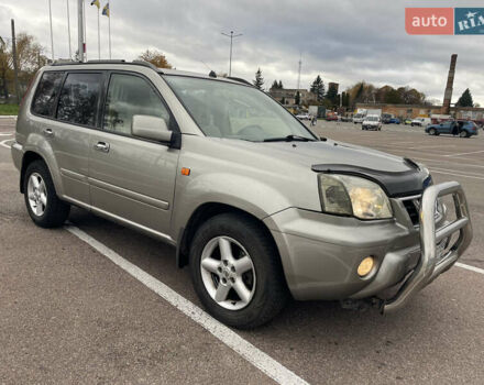 Серый Ниссан ИксТрейл, объемом двигателя 2 л и пробегом 336 тыс. км за 5750 $, фото 3 на Automoto.ua