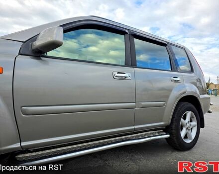 Серый Ниссан ИксТрейл, объемом двигателя 2 л и пробегом 220 тыс. км за 5800 $, фото 9 на Automoto.ua