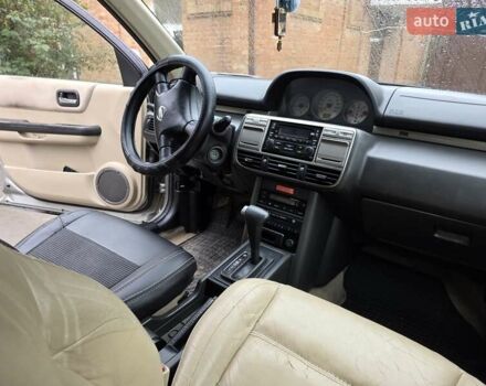Сірий Ніссан ІксТрейл, об'ємом двигуна 2 л та пробігом 335 тис. км за 4800 $, фото 17 на Automoto.ua