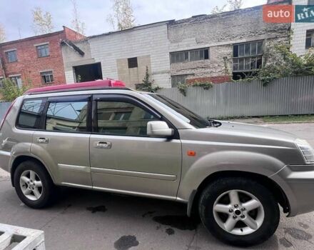 Серый Ниссан ИксТрейл, объемом двигателя 2 л и пробегом 262 тыс. км за 7079 $, фото 13 на Automoto.ua