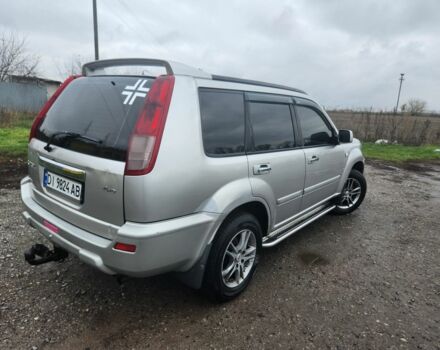 Сірий Ніссан ІксТрейл, об'ємом двигуна 2 л та пробігом 450 тис. км за 7000 $, фото 4 на Automoto.ua