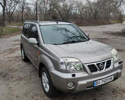 Сірий Ніссан ІксТрейл, об'ємом двигуна 2 л та пробігом 200 тис. км за 5900 $, фото 2 на Automoto.ua