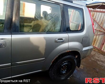 Сірий Ніссан ІксТрейл, об'ємом двигуна 2.5 л та пробігом 240 тис. км за 5800 $, фото 2 на Automoto.ua