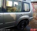 Сірий Ніссан ІксТрейл, об'ємом двигуна 2.5 л та пробігом 240 тис. км за 5800 $, фото 2 на Automoto.ua