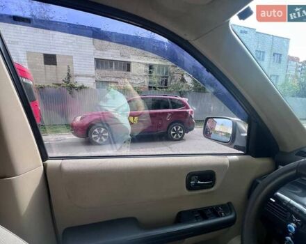 Серый Ниссан ИксТрейл, объемом двигателя 2 л и пробегом 262 тыс. км за 7079 $, фото 24 на Automoto.ua