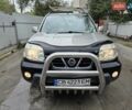 Сірий Ніссан ІксТрейл, об'ємом двигуна 2 л та пробігом 335 тис. км за 4800 $, фото 1 на Automoto.ua