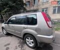 Серый Ниссан ИксТрейл, объемом двигателя 2 л и пробегом 262 тыс. км за 7079 $, фото 18 на Automoto.ua