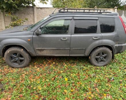 Серый Ниссан ИксТрейл, объемом двигателя 2.2 л и пробегом 290 тыс. км за 4000 $, фото 1 на Automoto.ua