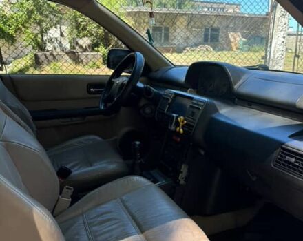 Серый Ниссан ИксТрейл, объемом двигателя 2.2 л и пробегом 281 тыс. км за 6000 $, фото 3 на Automoto.ua