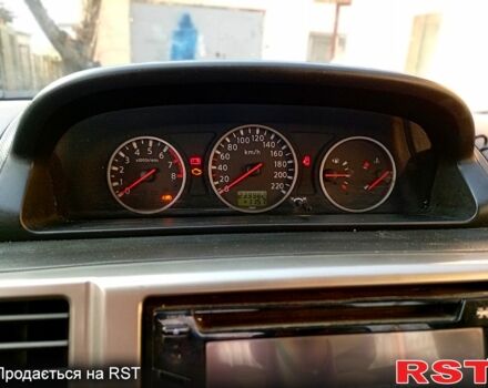 Сірий Ніссан ІксТрейл, об'ємом двигуна 2.5 л та пробігом 240 тис. км за 5800 $, фото 8 на Automoto.ua