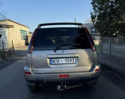 Серый Ниссан ИксТрейл, объемом двигателя 2 л и пробегом 333 тыс. км за 2999 $, фото 3 на Automoto.ua