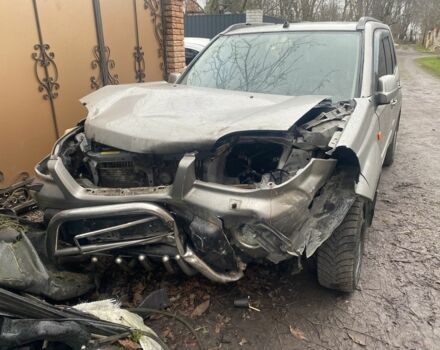 Серый Ниссан ИксТрейл, объемом двигателя 2 л и пробегом 280 тыс. км за 3500 $, фото 4 на Automoto.ua