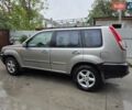 Сірий Ніссан ІксТрейл, об'ємом двигуна 2 л та пробігом 335 тис. км за 4800 $, фото 3 на Automoto.ua