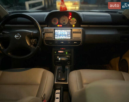 Серый Ниссан ИксТрейл, объемом двигателя 2.5 л и пробегом 320 тыс. км за 4800 $, фото 4 на Automoto.ua