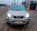 Сірий Ніссан ІксТрейл, об'ємом двигуна 2 л та пробігом 312 тис. км за 6500 $, фото 1 на Automoto.ua