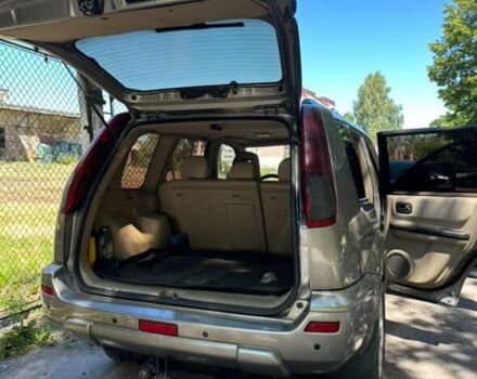 Серый Ниссан ИксТрейл, объемом двигателя 2.2 л и пробегом 281 тыс. км за 6000 $, фото 6 на Automoto.ua