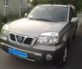 Серый Ниссан ИксТрейл, объемом двигателя 2 л и пробегом 330 тыс. км за 5759 $, фото 6 на Automoto.ua