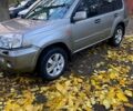 Серый Ниссан ИксТрейл, объемом двигателя 2 л и пробегом 251 тыс. км за 5600 $, фото 1 на Automoto.ua