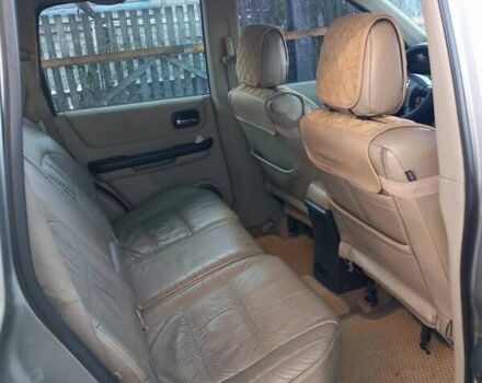 Сірий Ніссан ІксТрейл, об'ємом двигуна 2 л та пробігом 253 тис. км за 5500 $, фото 6 на Automoto.ua