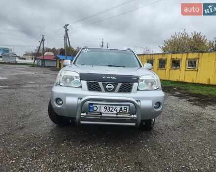 Серый Ниссан ИксТрейл, объемом двигателя 2.5 л и пробегом 450 тыс. км за 7000 $, фото 3 на Automoto.ua