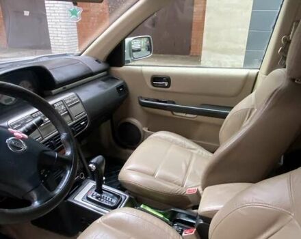 Сірий Ніссан ІксТрейл, об'ємом двигуна 2.5 л та пробігом 200 тис. км за 5400 $, фото 3 на Automoto.ua