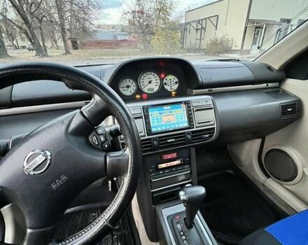 Сірий Ніссан ІксТрейл, об'ємом двигуна 2 л та пробігом 312 тис. км за 5300 $, фото 12 на Automoto.ua