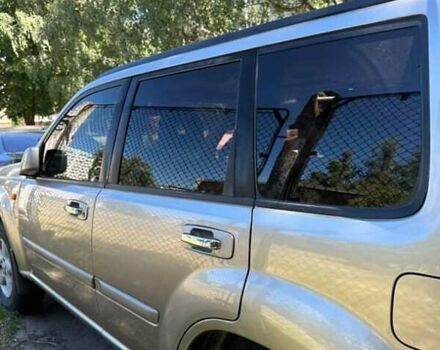 Серый Ниссан ИксТрейл, объемом двигателя 2.2 л и пробегом 281 тыс. км за 6500 $, фото 7 на Automoto.ua