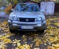 Серый Ниссан ИксТрейл, объемом двигателя 2 л и пробегом 251 тыс. км за 5600 $, фото 1 на Automoto.ua