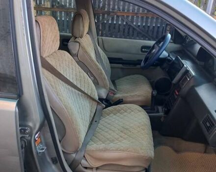 Сірий Ніссан ІксТрейл, об'ємом двигуна 2 л та пробігом 253 тис. км за 5500 $, фото 4 на Automoto.ua