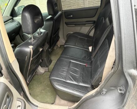 Серый Ниссан ИксТрейл, объемом двигателя 2.2 л и пробегом 290 тыс. км за 4000 $, фото 3 на Automoto.ua