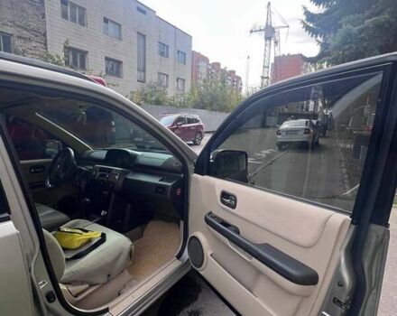 Серый Ниссан ИксТрейл, объемом двигателя 2 л и пробегом 262 тыс. км за 7079 $, фото 12 на Automoto.ua