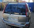 Сірий Ніссан ІксТрейл, об'ємом двигуна 2 л та пробігом 320 тис. км за 5500 $, фото 3 на Automoto.ua