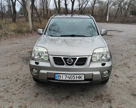 Сірий Ніссан ІксТрейл, об'ємом двигуна 2 л та пробігом 200 тис. км за 5900 $, фото 1 на Automoto.ua