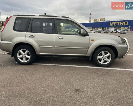 Серый Ниссан ИксТрейл, объемом двигателя 2 л и пробегом 336 тыс. км за 5750 $, фото 4 на Automoto.ua